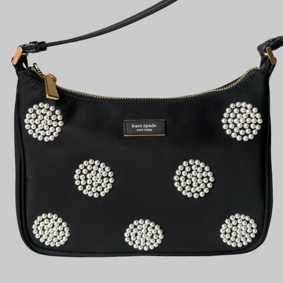 Kate Spade Embellished durable woven nylon with leather trim
Matte lining - Picture 12 of 12